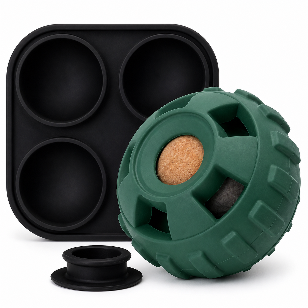 Black silicone mold and green textured ball with cork center on a white background